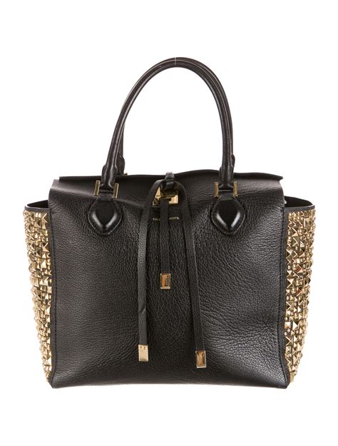 descriptive words to sell a michael kors used handbag|does Michael Kors sell items.